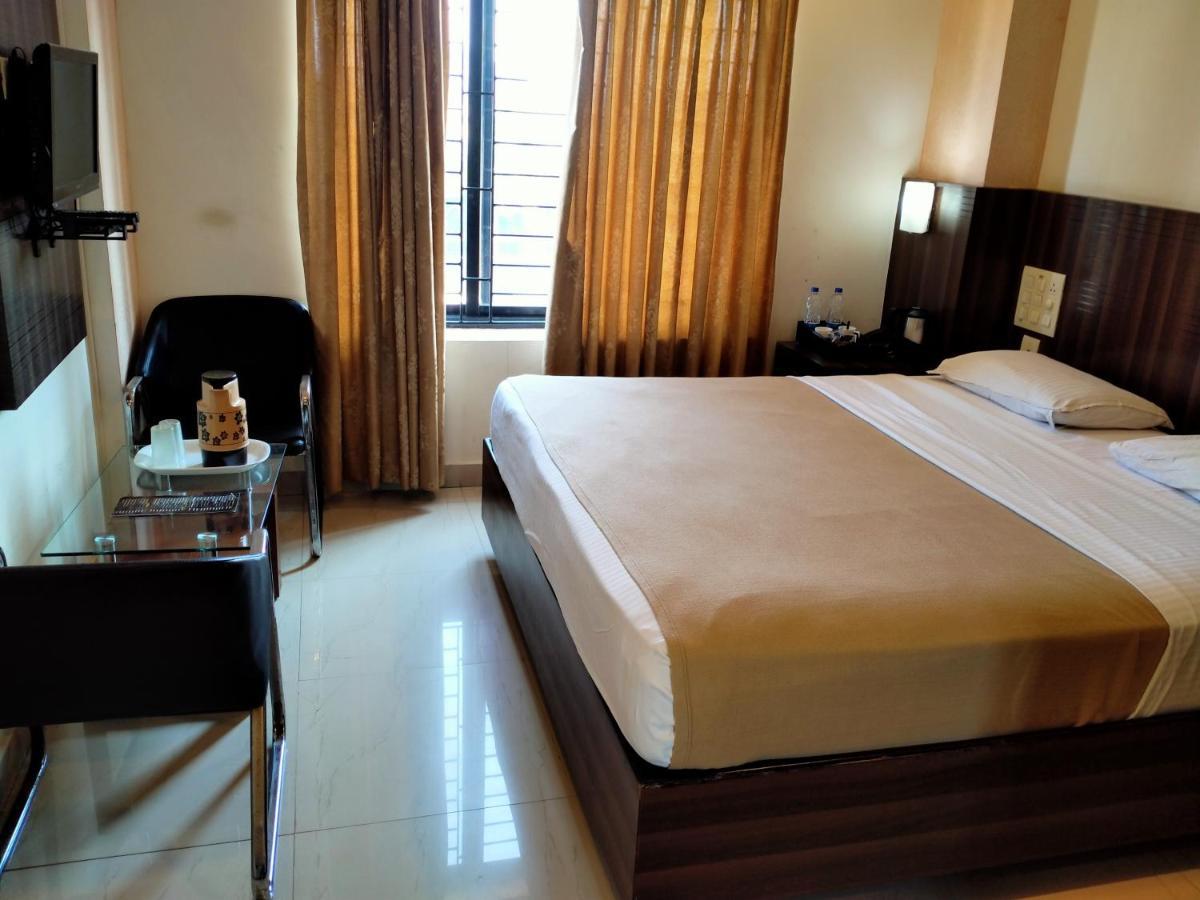 Hotel Green Park Suites Manipal Extérieur photo